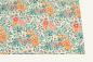 Preview: Photo album with a graphic flower pattern in orange and yellow, with a red satin ribbon for tying